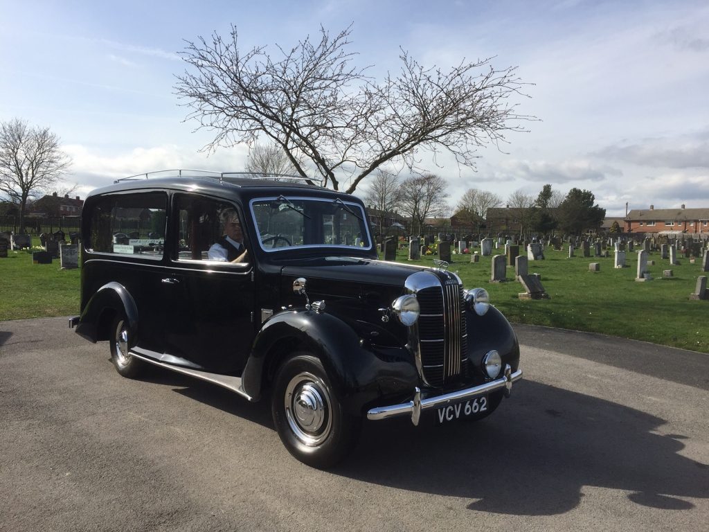 Hearse in cemetery